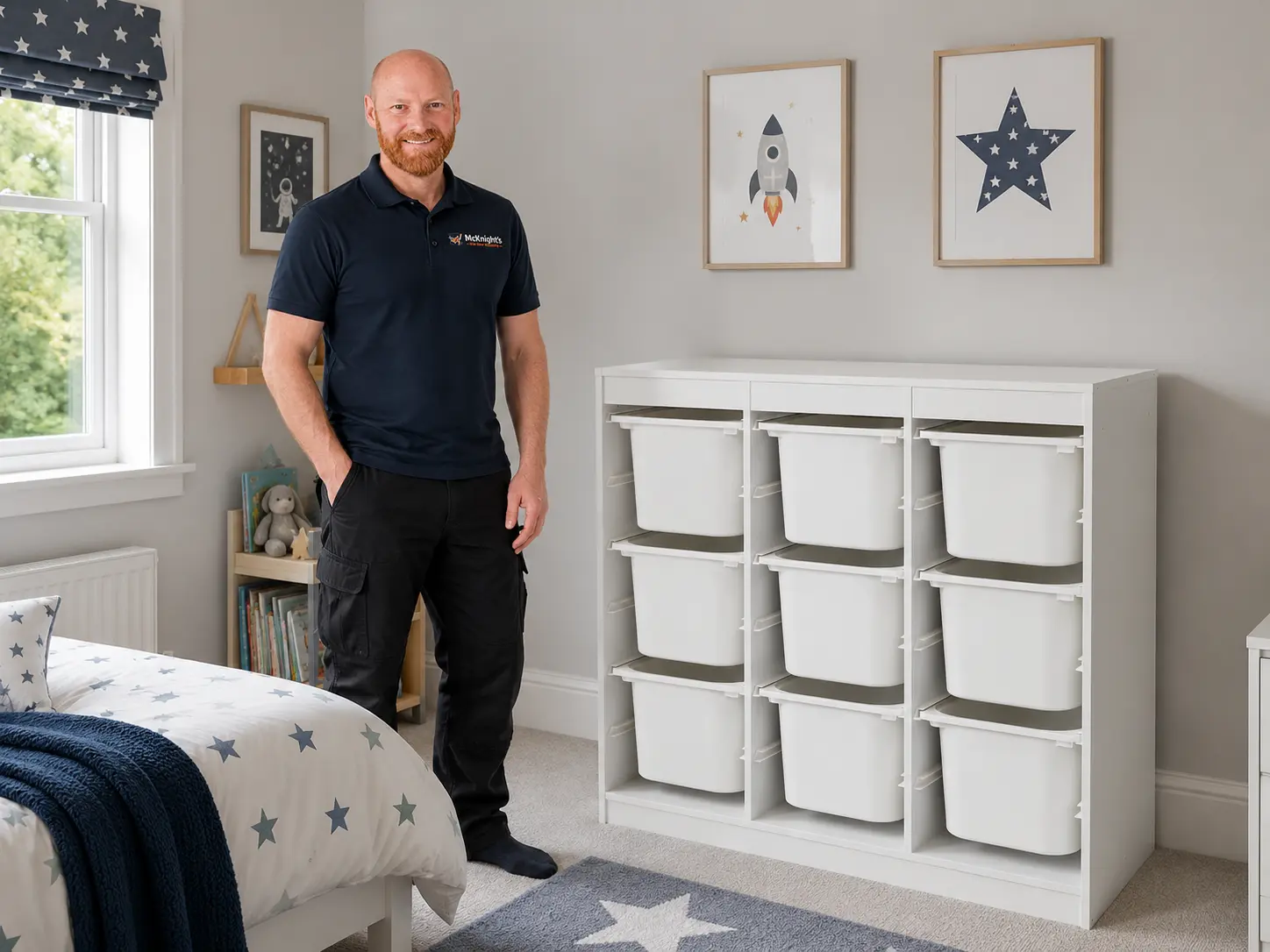 Mark McKnight beside an assembled IKEA-style children's storage unit in Ballyclare